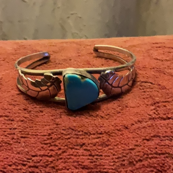 Native American sterling silver and turquoise cuff bracelet. Vintage 1974